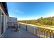 Relaxing deck area with seating and views of the tranquil waterfront at 1264 Spoonbill Landings Cir, Bradenton, FL 34209