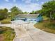 Charming single-story home with a large driveway and covered carport at 13241 Miami St, Hudson, FL 34667
