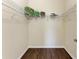 Walk-in closet with laminate floors and wire shelving, ready for organization at 135 Sweet Tree St, Bradenton, FL 34212
