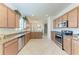 Spacious kitchen with stainless steel appliances, granite counters, and plenty of cabinet space for storage at 135 Sweet Tree St, Bradenton, FL 34212