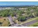 Expansive aerial view showcases a tranquil community, lush green spaces, and scenic waterfront views at 1533 42Nd Avenue E Dr # 48, Ellenton, FL 34222