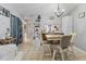 Dining area with counter-height table and seating for four, next to laundry, perfect for casual meals at 1533 42Nd Avenue E Dr # 48, Ellenton, FL 34222