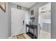 Inviting entryway with a console table, decor accents, and easy access to the kitchen at 1533 42Nd Avenue E Dr # 48, Ellenton, FL 34222