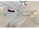 Bedroom featuring a television, ceiling fan and neutral colors at 18028 Gawthrop Dr # 203, Bradenton, FL 34211