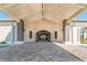 Grand entrance showcasing a stone-paved driveway and an inviting covered entryway at 18028 Gawthrop Dr # 203, Bradenton, FL 34211