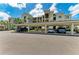 Exterior of condo with covered parking showing a well maintained parking area at 18028 Gawthrop Dr # 203, Bradenton, FL 34211