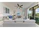Inviting living room with comfortable seating, TV, and a large window view at 18028 Gawthrop Dr # 203, Bradenton, FL 34211