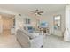 Comfortable living room featuring a ceiling fan, TV, and neutral colors at 18028 Gawthrop Dr # 203, Bradenton, FL 34211