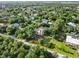 Aerial shot of a home with a private pool, offering a serene and secluded setting with mature trees surrounding the property at 1860 Citron St, Punta Gorda, FL 33980