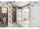 Elegant bathroom featuring a tub beneath a window and a separate shower space at 1860 Citron St, Punta Gorda, FL 33980