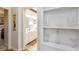 Bright bathroom featuring tile floors, and sinks, and built-in shelving unit at 1860 Citron St, Punta Gorda, FL 33980