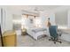 Bright bedroom with neutral walls, a ceiling fan, and a single bed with stylish decor at 1860 Citron St, Punta Gorda, FL 33980