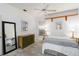 Bedroom boasting crisp white walls and simple decor, complemented by soft, natural light at 1860 Citron St, Punta Gorda, FL 33980