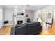 Cozy living room featuring a fireplace, hardwood floors, and an open layout at 1860 Citron St, Punta Gorda, FL 33980
