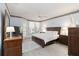 Inviting bedroom with light floors, stylish furniture, and bright natural light at 1860 Citron St, Punta Gorda, FL 33980