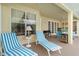 Relaxing patio with lounge chairs, a grill, and access to an outdoor dining area at 1860 Citron St, Punta Gorda, FL 33980