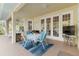 Inviting outdoor patio setup with a dining table, chairs, and comfortable lounge seating at 1860 Citron St, Punta Gorda, FL 33980