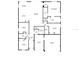 Detailed floor plan showcasing the layout of the home including the kitchen, bedrooms, and garage at 2017 Woodleaf Hammock Ct, Bradenton, FL 34211