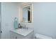 Clean bathroom featuring a well-lit mirror, ample counter space and modern design at 2227 Sunset Dr # E22, Bradenton, FL 34207