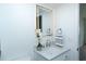 Tastefully updated bathroom featuring a vanity with a modern mirror and sink at 2227 Sunset Dr # E22, Bradenton, FL 34207