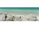 Scenic beach view with turquoise water, white sand and limestone rocks on the beach at 2227 Sunset Dr # E22, Bradenton, FL 34207