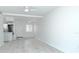 Spacious, bright and airy living space featuring durable flooring and a ceiling fan at 2227 Sunset Dr # E22, Bradenton, FL 34207