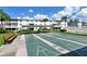 Shuffleboard courts with shaded seating in a beautifully landscaped community setting at 2227 Sunset Dr # E22, Bradenton, FL 34207