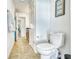 Bright bathroom featuring tile flooring and updated fixtures throughout the space at 2605 Sunnybrook Dr, Sarasota, FL 34239