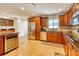 Renovated kitchen featuring stainless steel appliances, and brown cabinets at 2605 Sunnybrook Dr, Sarasota, FL 34239