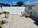 Cozy patio area with outdoor seating, providing a perfect space for relaxation and entertaining at 2605 Sunnybrook Dr, Sarasota, FL 34239