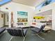 Spacious living room with sleek furniture, a skylight, and modern decor, offering a bright and airy atmosphere at 2720 Herwald St, Sarasota, FL 34231