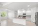 Eat-in kitchen with granite countertops, stainless appliances, and large island at 27407 Deep Creek Blvd, Punta Gorda, FL 33983