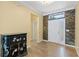 Welcoming foyer with tile flooring, decorative stone accent wall, and a stylish console table at 2819 130Th E Ave, Parrish, FL 34219