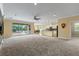Spacious open-concept layout with living room, dining area, and kitchen creating an ideal space for modern living at 2819 130Th E Ave, Parrish, FL 34219