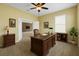 Bright office featuring built in shelving, a wooden desk and natural lighting at 2819 130Th E Ave, Parrish, FL 34219