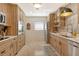 Modern kitchen with stainless steel appliances, sleek countertops, and ample cabinet space at 314 28Th W St, Bradenton, FL 34205