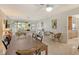 Spacious living room with dining area and kitchen access, providing ample natural light at 314 28Th W St, Bradenton, FL 34205