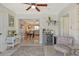 Cozy living area featuring a wine fridge, and a view to the adjacent dining area at 314 28Th W St, Bradenton, FL 34205