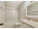 Clean bathroom features a shower-tub combo, ample vanity space, and bright lighting at 3403 Clark Rd # 203, Sarasota, FL 34231