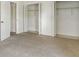 Bedroom with ample closet space for convenient storage and organization at 3403 Clark Rd # 203, Sarasota, FL 34231