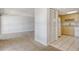 Open living area providing seamless flow to kitchen and closet spaces at 3403 Clark Rd # 203, Sarasota, FL 34231