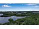 Scenic aerial view showcasing lush greenery and tranquil waterways at 3621 North Point Rd # 603, Osprey, FL 34229
