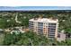 Aerial view of the condo community surrounded by lush landscaping at 3621 North Point Rd # 603, Osprey, FL 34229