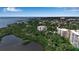 Stunning aerial perspective of the waterfront condo community at 3621 North Point Rd # 603, Osprey, FL 34229