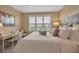 Bedroom featuring a corner desk and a view at 3621 North Point Rd # 603, Osprey, FL 34229