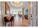 Foyer leading to an open living and dining area with columns at 3621 North Point Rd # 603, Osprey, FL 34229