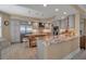 Modern kitchen with granite countertops, stainless steel appliances, and custom cabinetry at 3621 North Point Rd # 603, Osprey, FL 34229