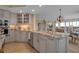 Bright kitchen with granite countertops, stainless appliances and an open floor plan at 3621 North Point Rd # 603, Osprey, FL 34229