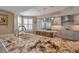 Spacious kitchen featuring granite countertops, stainless steel appliances, and ample cabinet space at 3621 North Point Rd # 603, Osprey, FL 34229