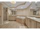 Bright bathroom featuring a soaking tub, dual sinks and vanities, and detailed tiling at 3621 North Point Rd # 603, Osprey, FL 34229